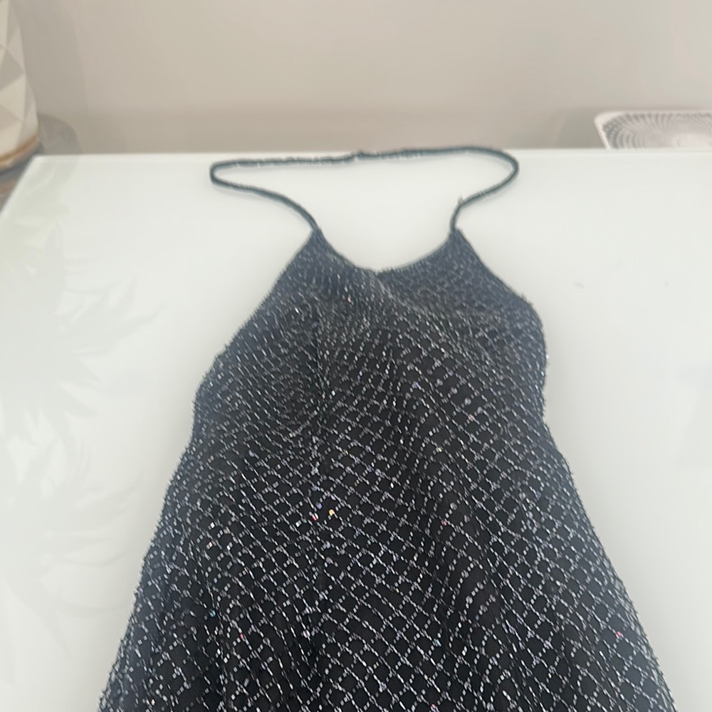 Elegant halter style multi color beading gown. Built in bra.